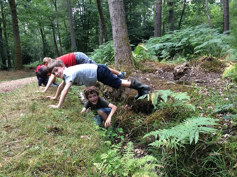 children forming a bridge